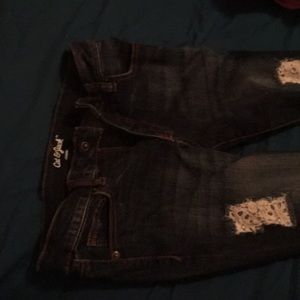 Jeans with lace under holes